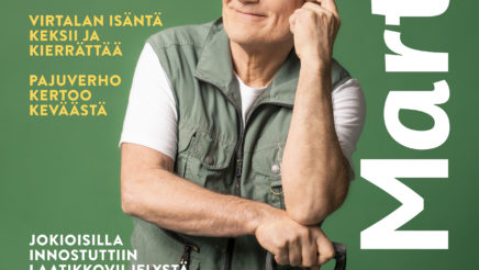Martat-lehden kansi. Vihreä tausta, mies seisoo nojaten lapioon ja hymyilee.